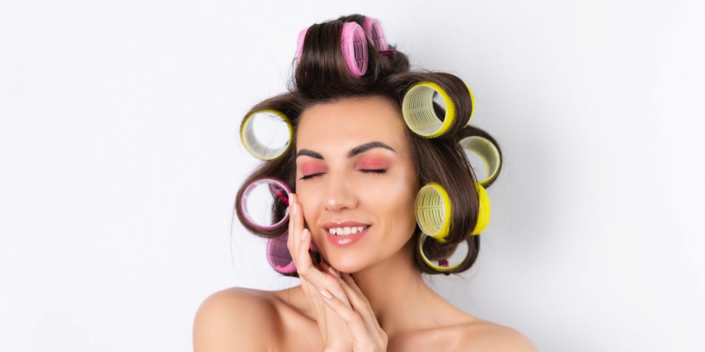 woman with hair rollers