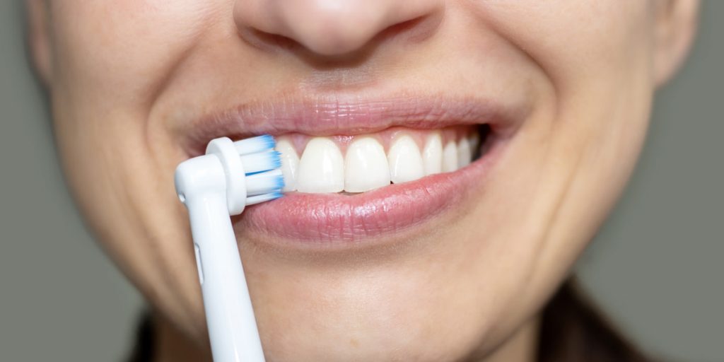 Use an electric toothbrush 1024x512 - How To Make Teeth White: 12 Ways To Make Your Teeth Whiter