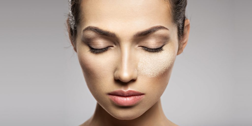 girl with closed eyes and bronzer on her cheek