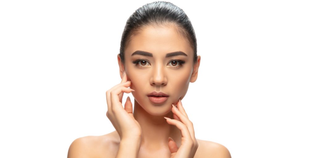 asian girl with pure skin on white background