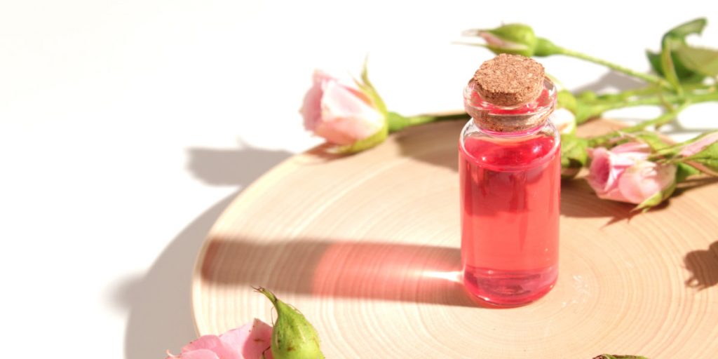 small jar with rose water