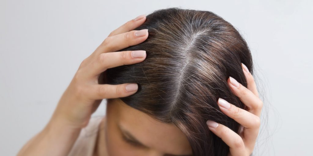 a woman with first gray hair