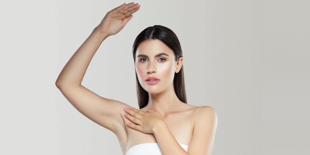 girl is showing her armpits