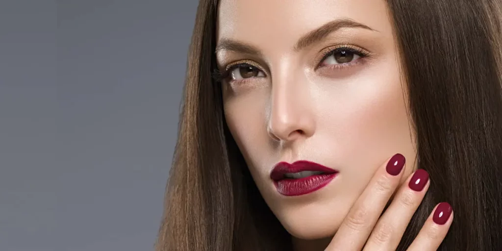 woman with burgundy lips